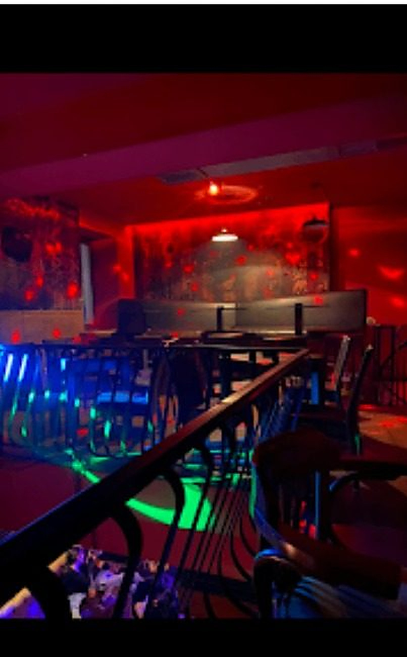 Interior of the bar bathed in red light